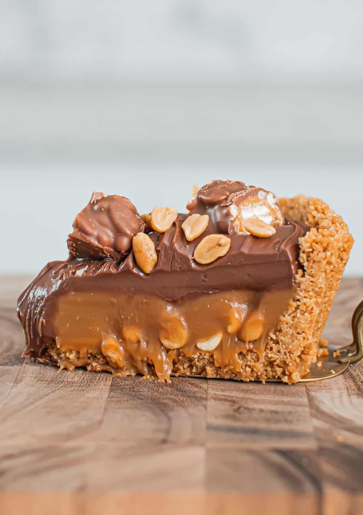 Slice of No-bake Picnic Pie sitting on a chopping board