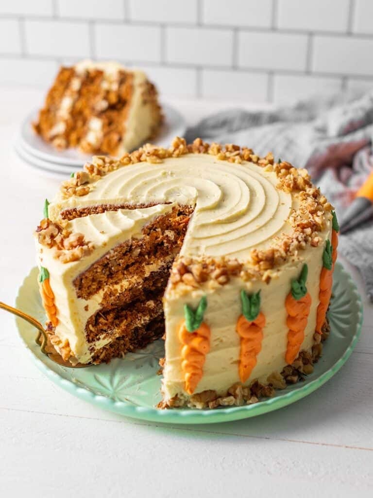 Image of a full cake with a slice taken out of it