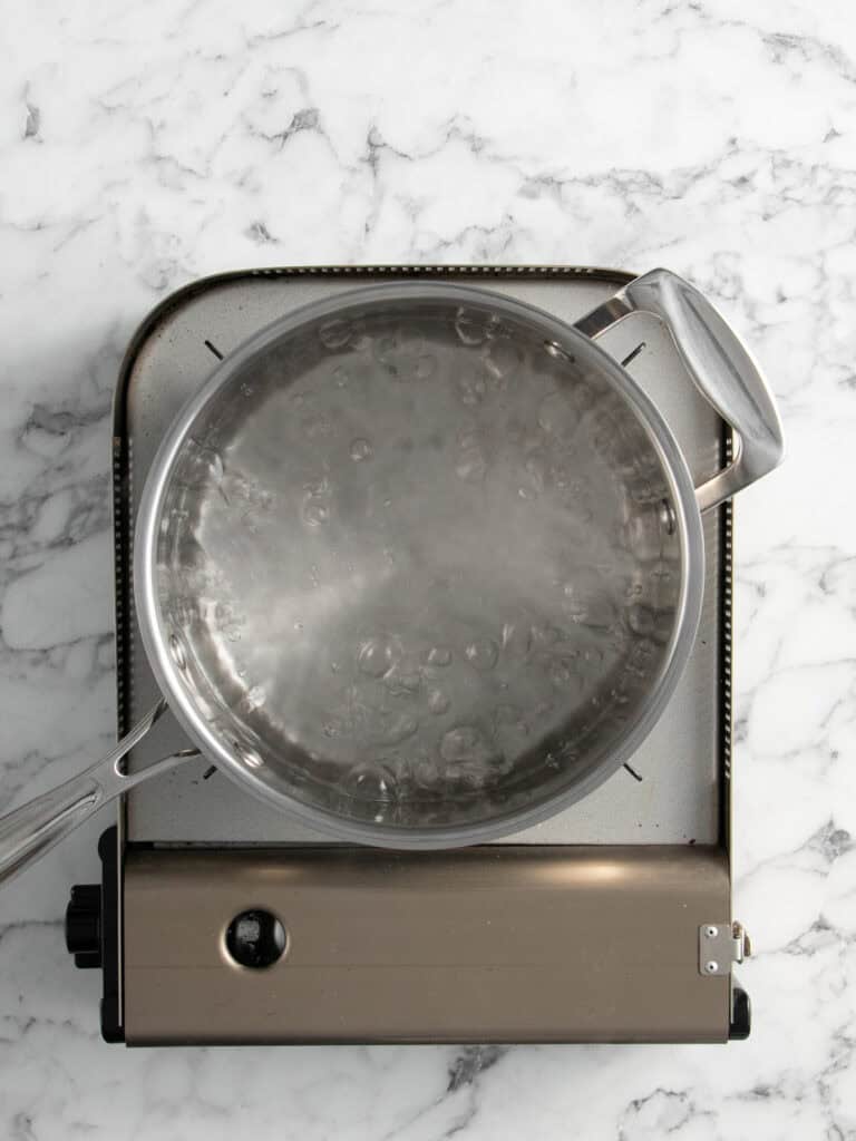 Top down shot of a double boiler boiling away