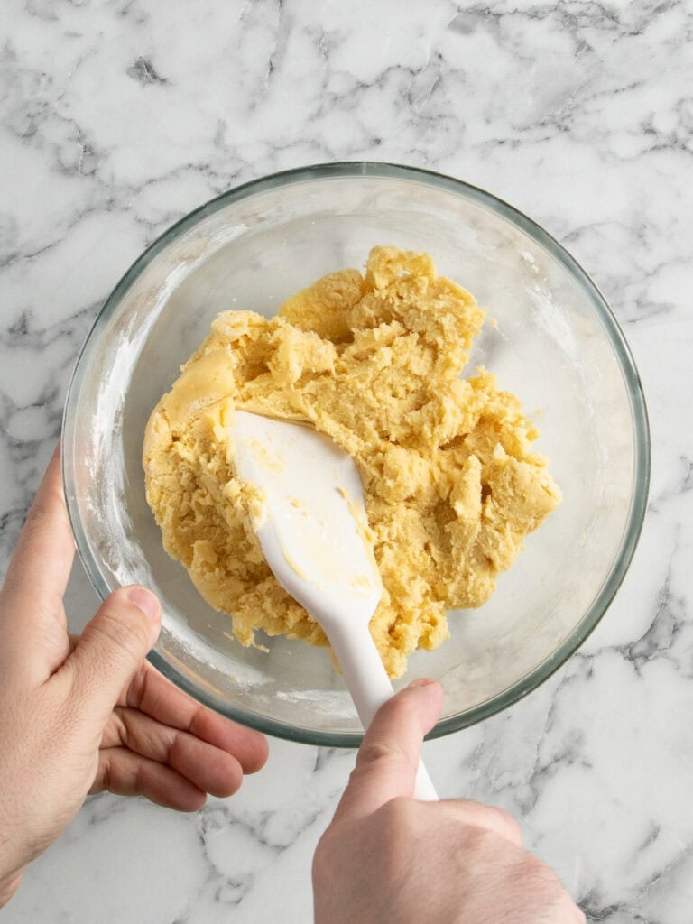 Add the flour to the butter mixture to form a dough