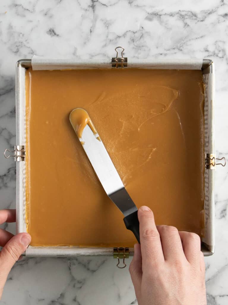 Spread the mixture on top of the baked shortbread layer