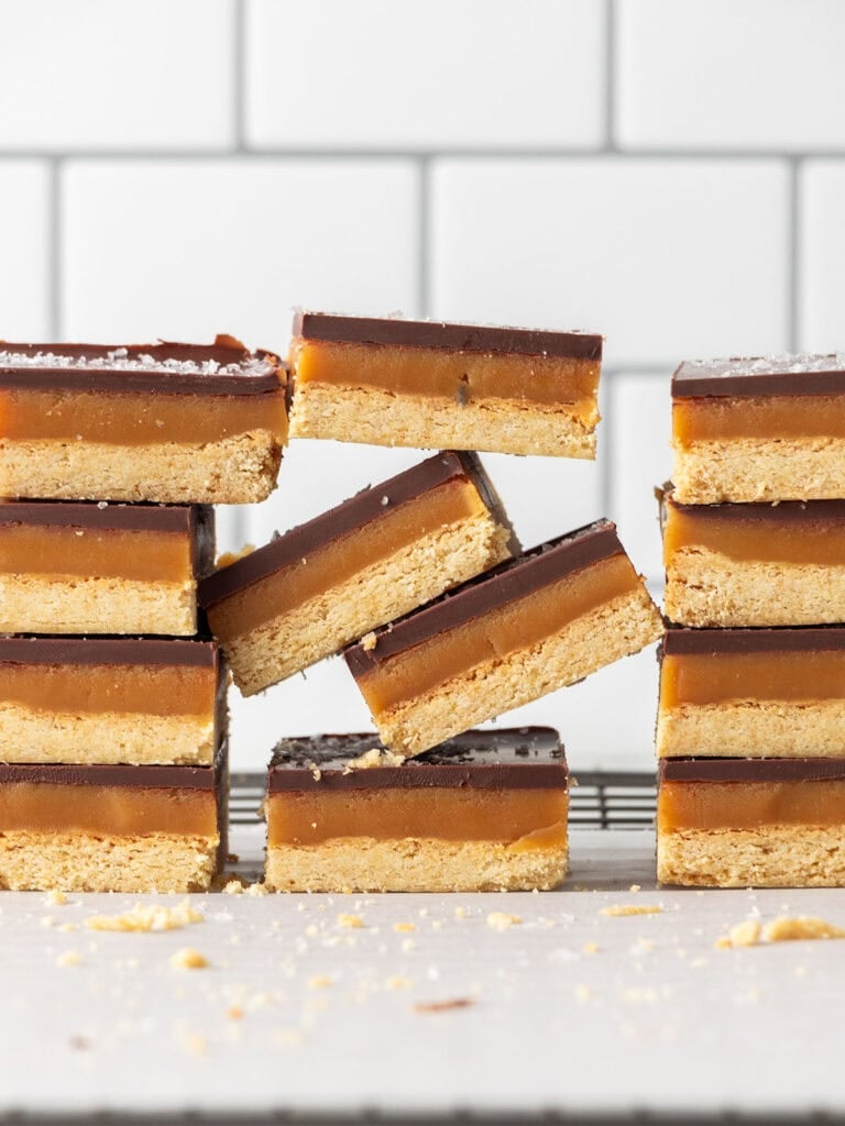 Uneven stack of caramel and shortbread bars
