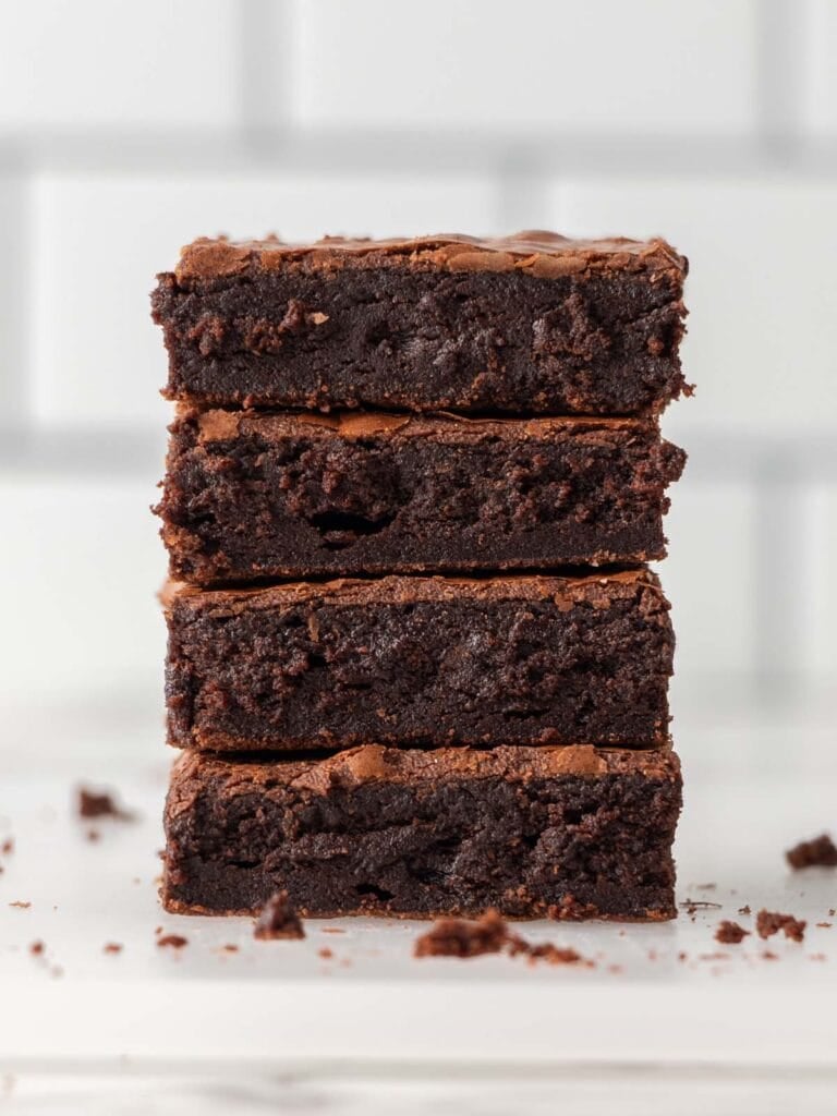 Stack of four moist chocolate brownies
