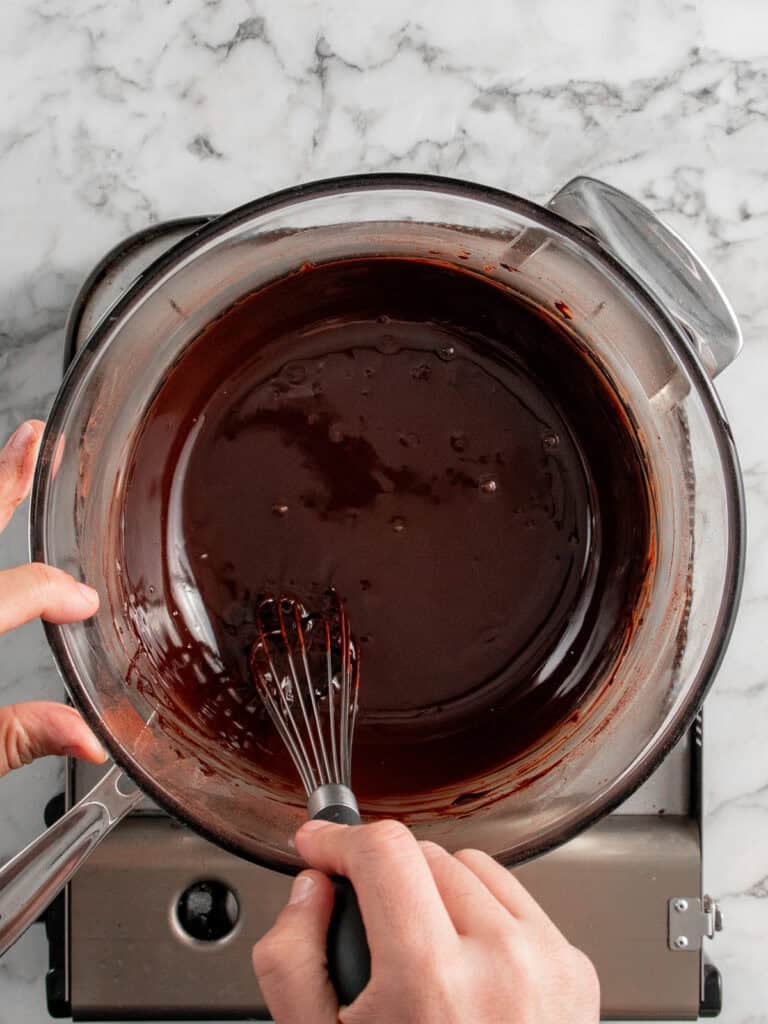Whisking the chocolate and butter together