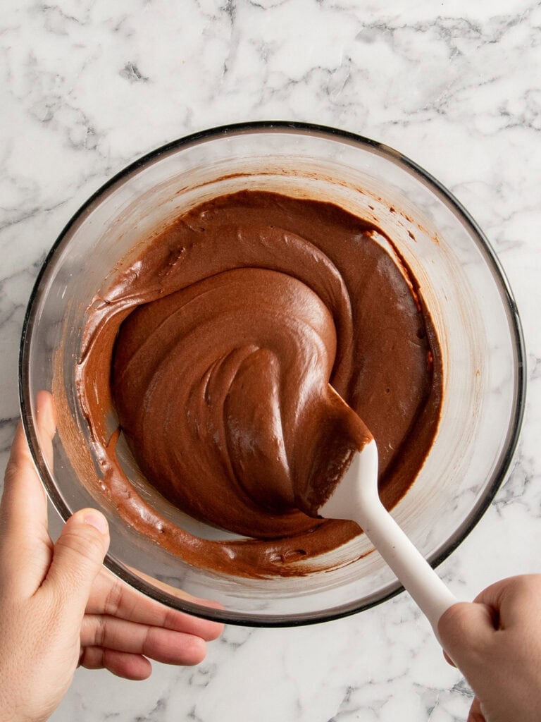 Mixing in the chocolate and then the flour and salt