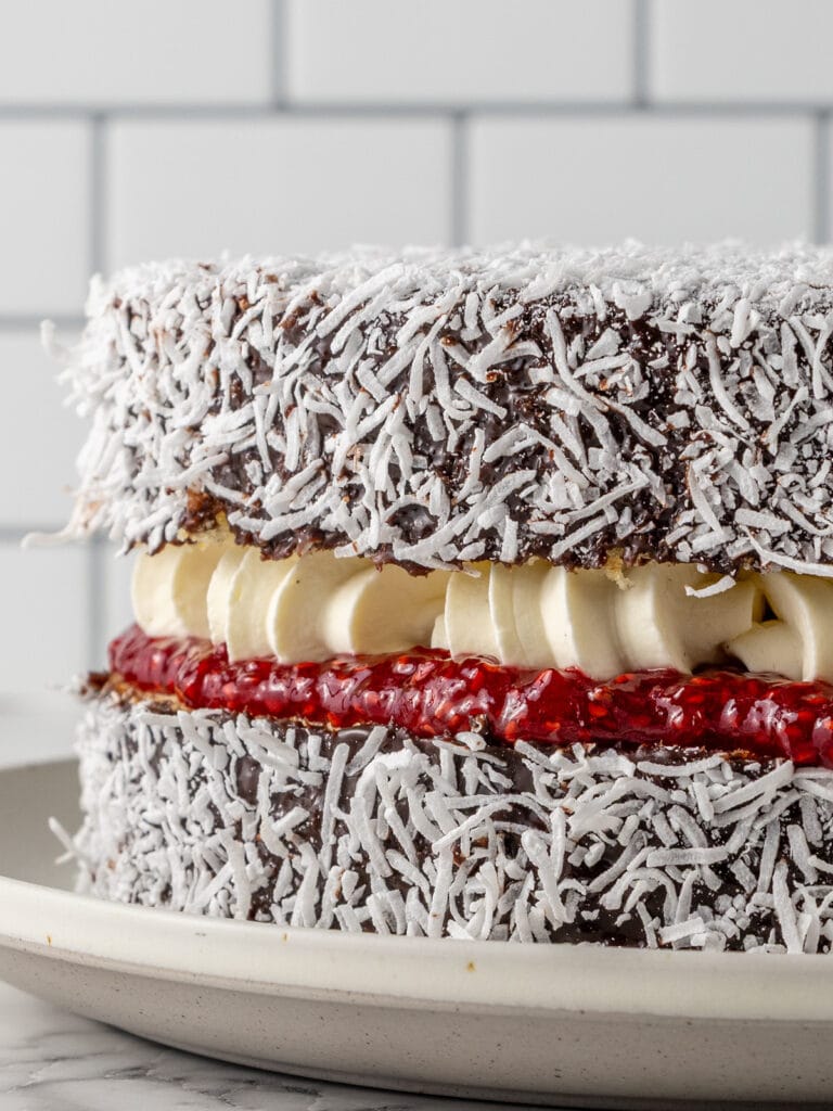 What the cake looks like when the final layer is added on top of the cream