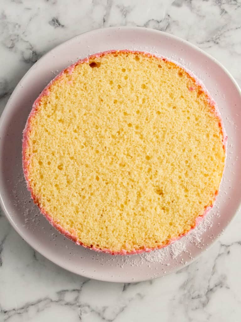 Adding the first layer of sponge on the serving plate