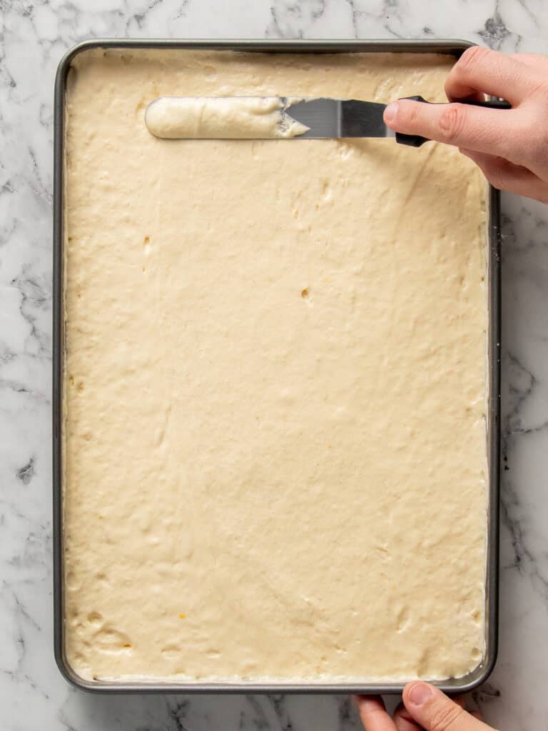 Spreading the batter into the baking tin