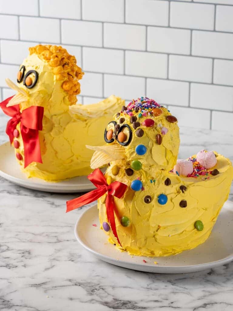 Showing my cake together with the one a 3 year old decorated.