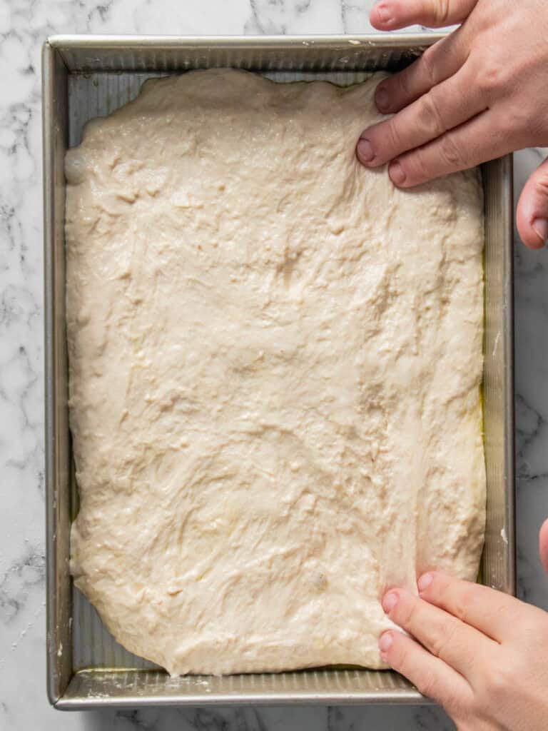 Adding the thawed dough into the baking dish