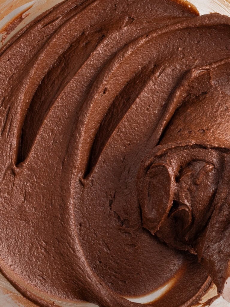 Close up shot of the gritty easy nostalgic chocolate frosting