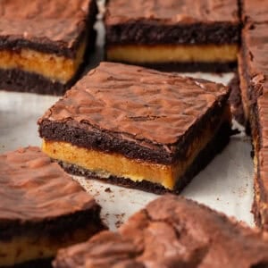 Square image for layered caramel and chocolate bars
