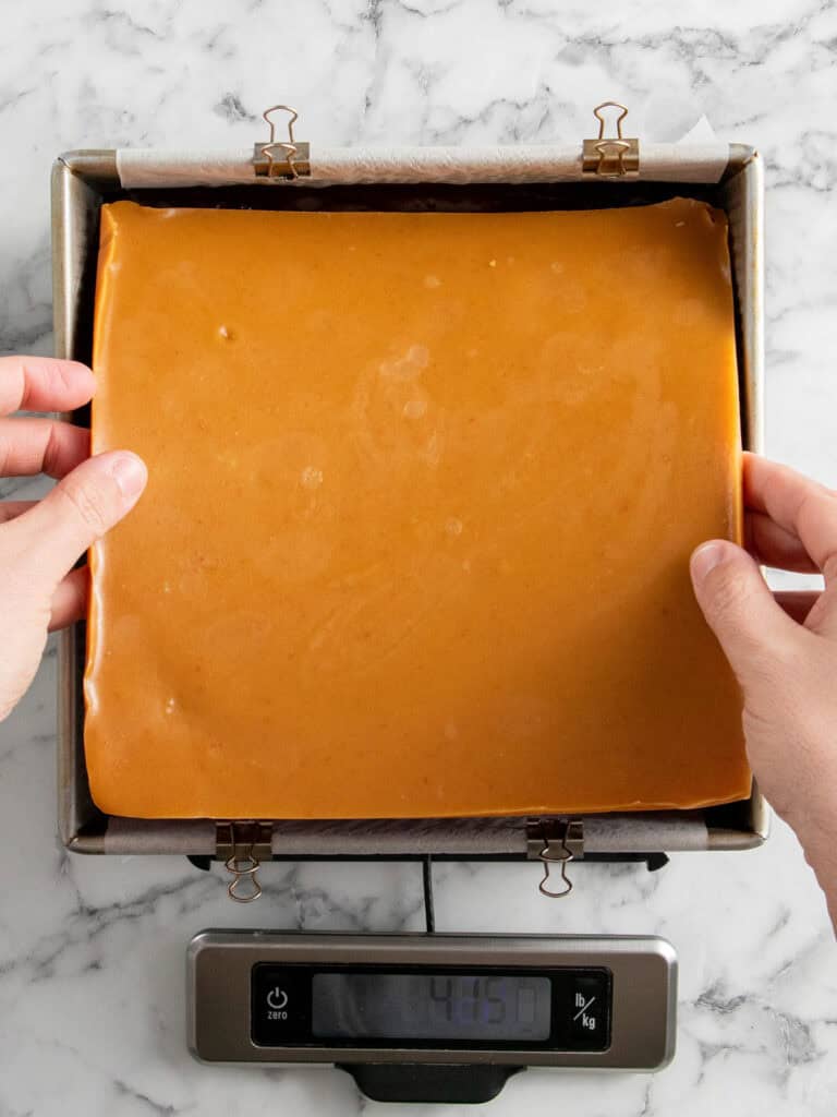 Adding the caramel on top of the chocolate batter