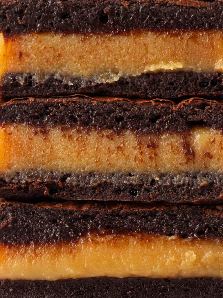 Extreme close up of layered caramel and chocolate bars