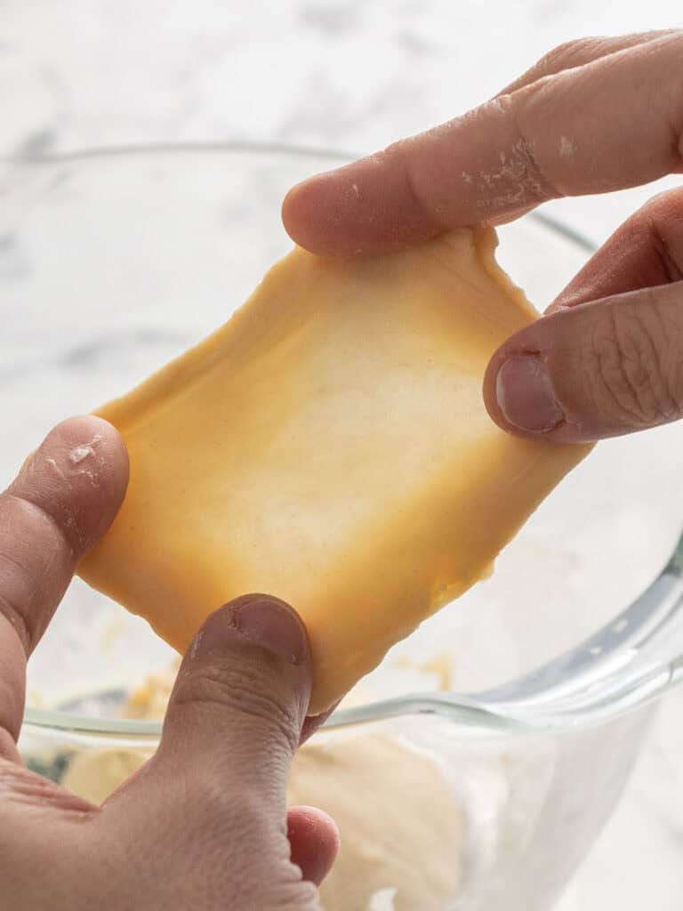 Showing the dough stretched out once its been fully kneaded