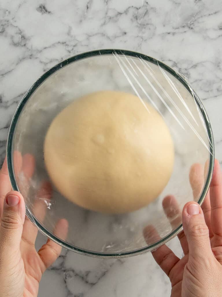 Showing what the dough looks like after rising for an hour