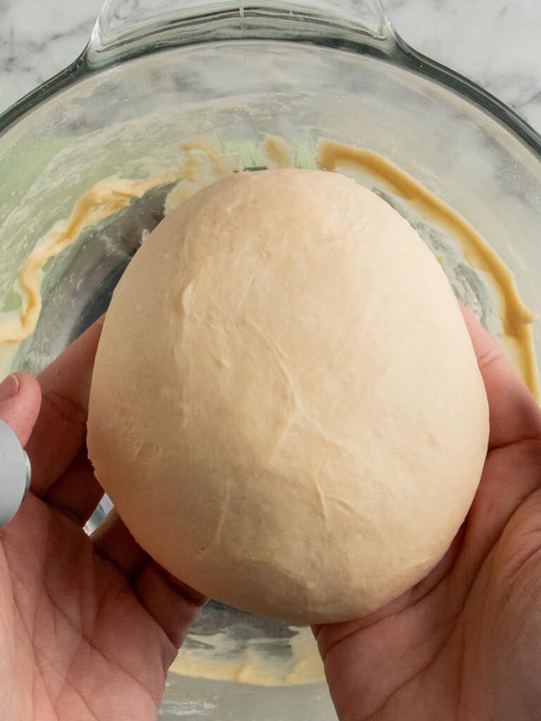 Showing how smooth the dough is