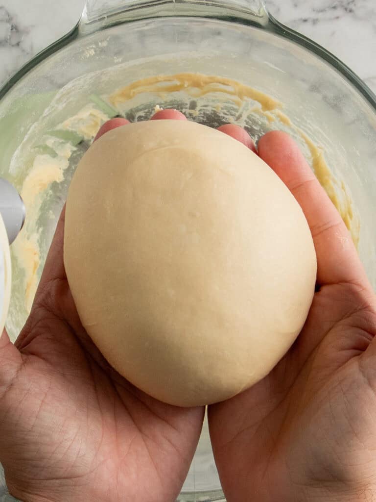 Showing how smooth the dough is after it's been fully kneaded