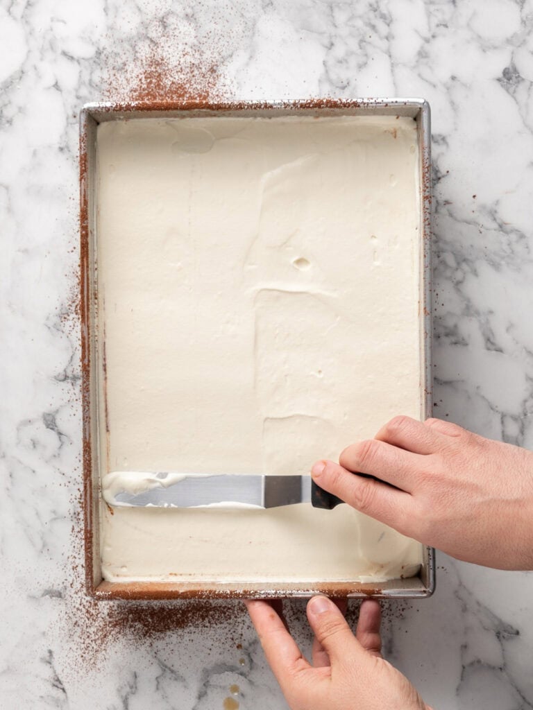 Add the first half of the cream on top