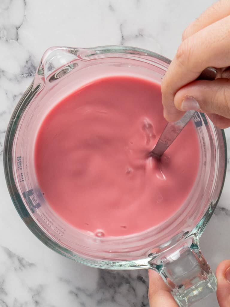 Whisking the cherry brine and corn starch to create a slurry