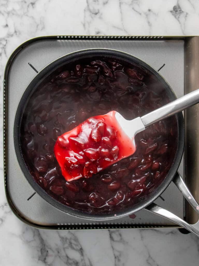 Showing what the mixed and thickened cherry sauce looks like