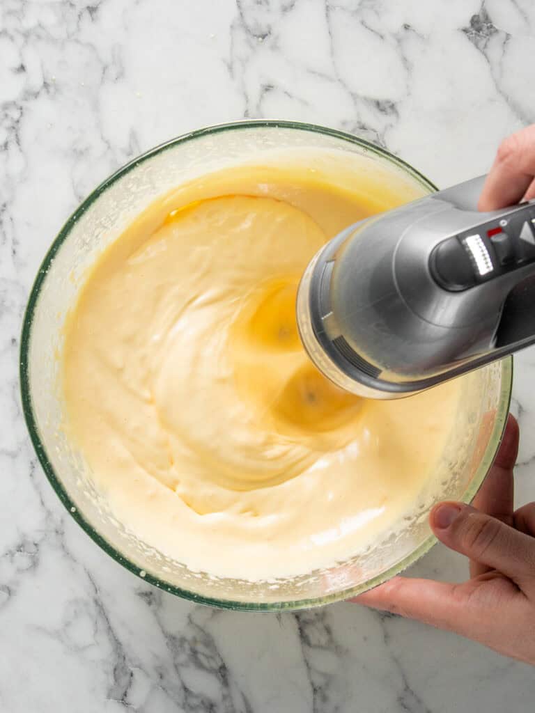 Whisking the egg yolks and sugar together