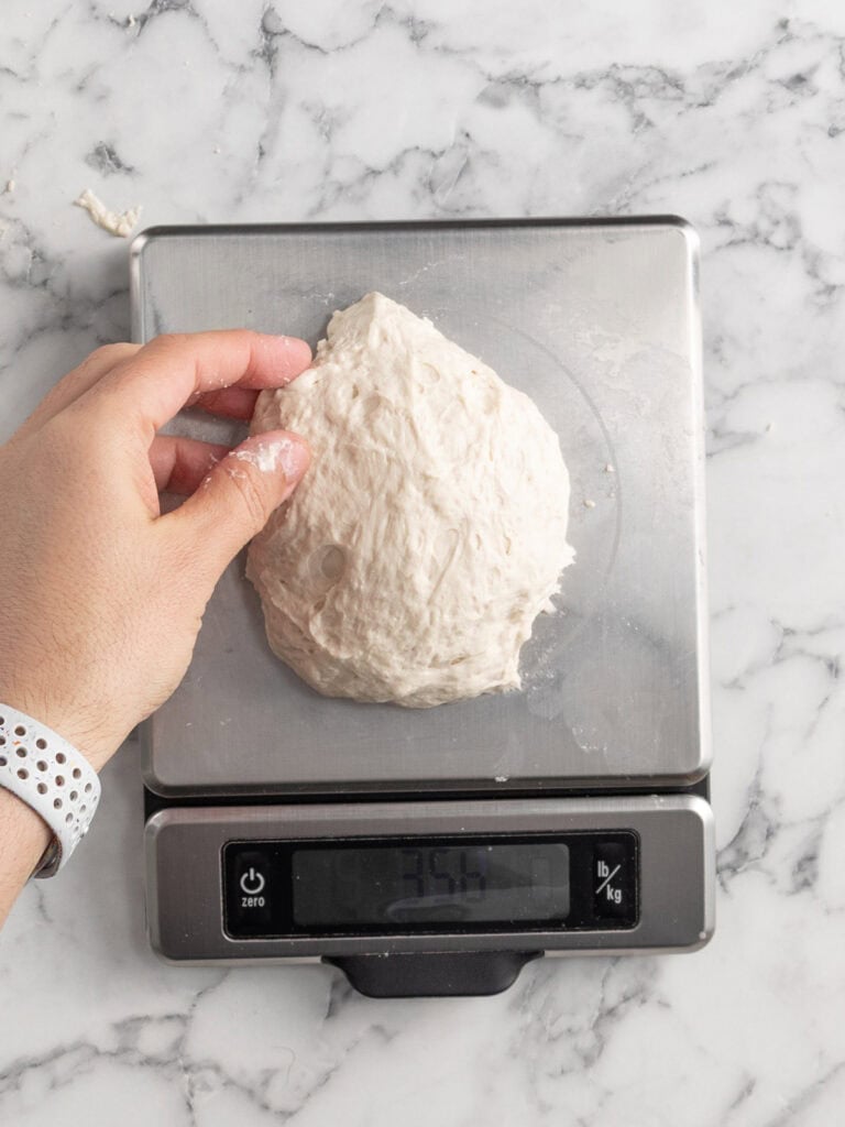 Weighing the dough to make sure everything is a nice even size
