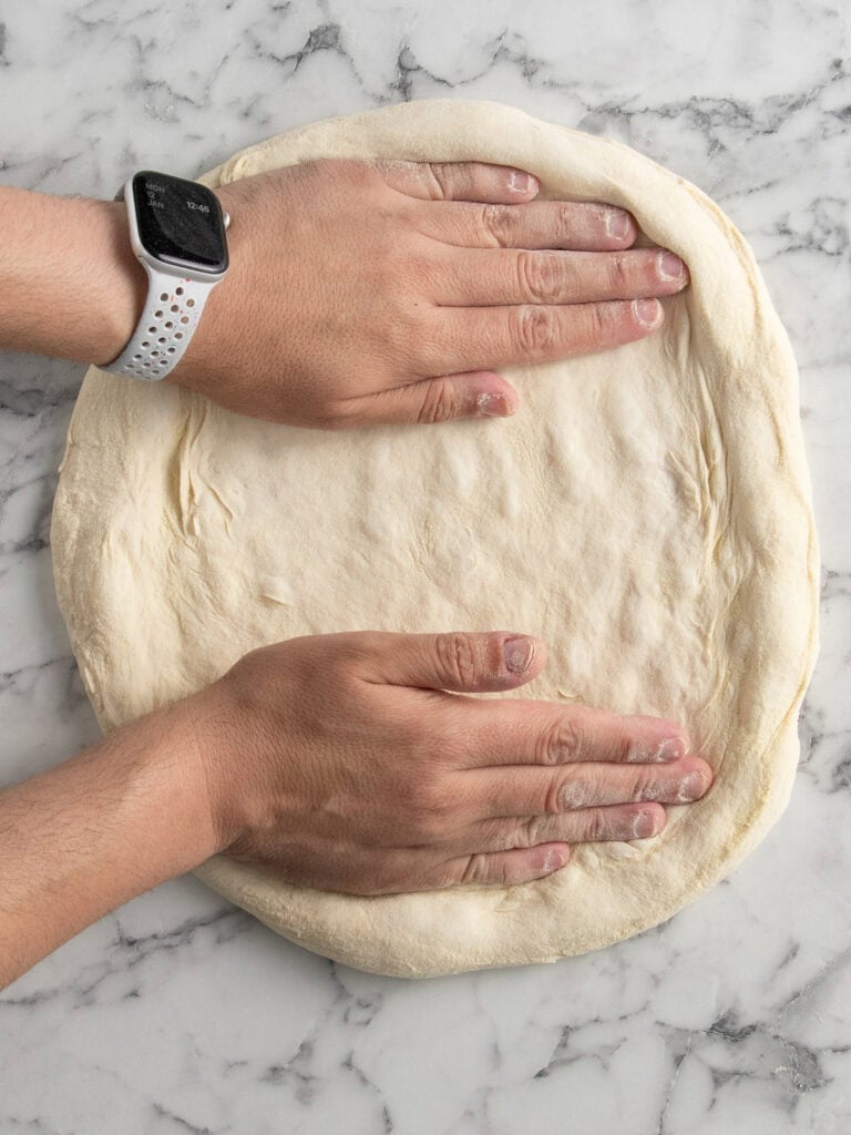 Stretching the dough out further