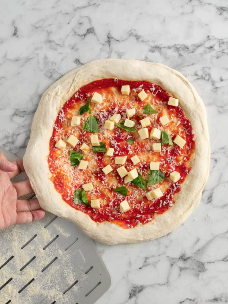 Lifting one side of the pizza up