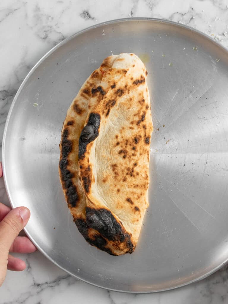 Showing the baked Calzone